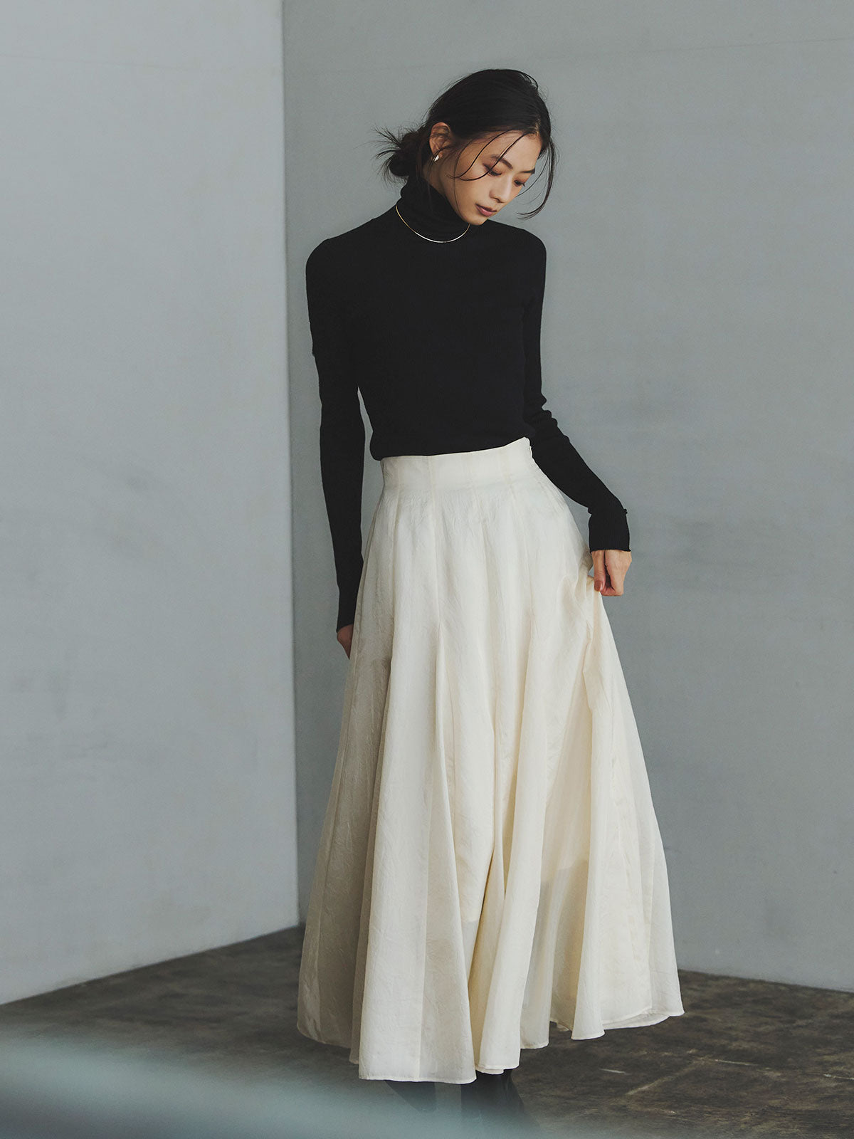 スラッシュリブニットトップス