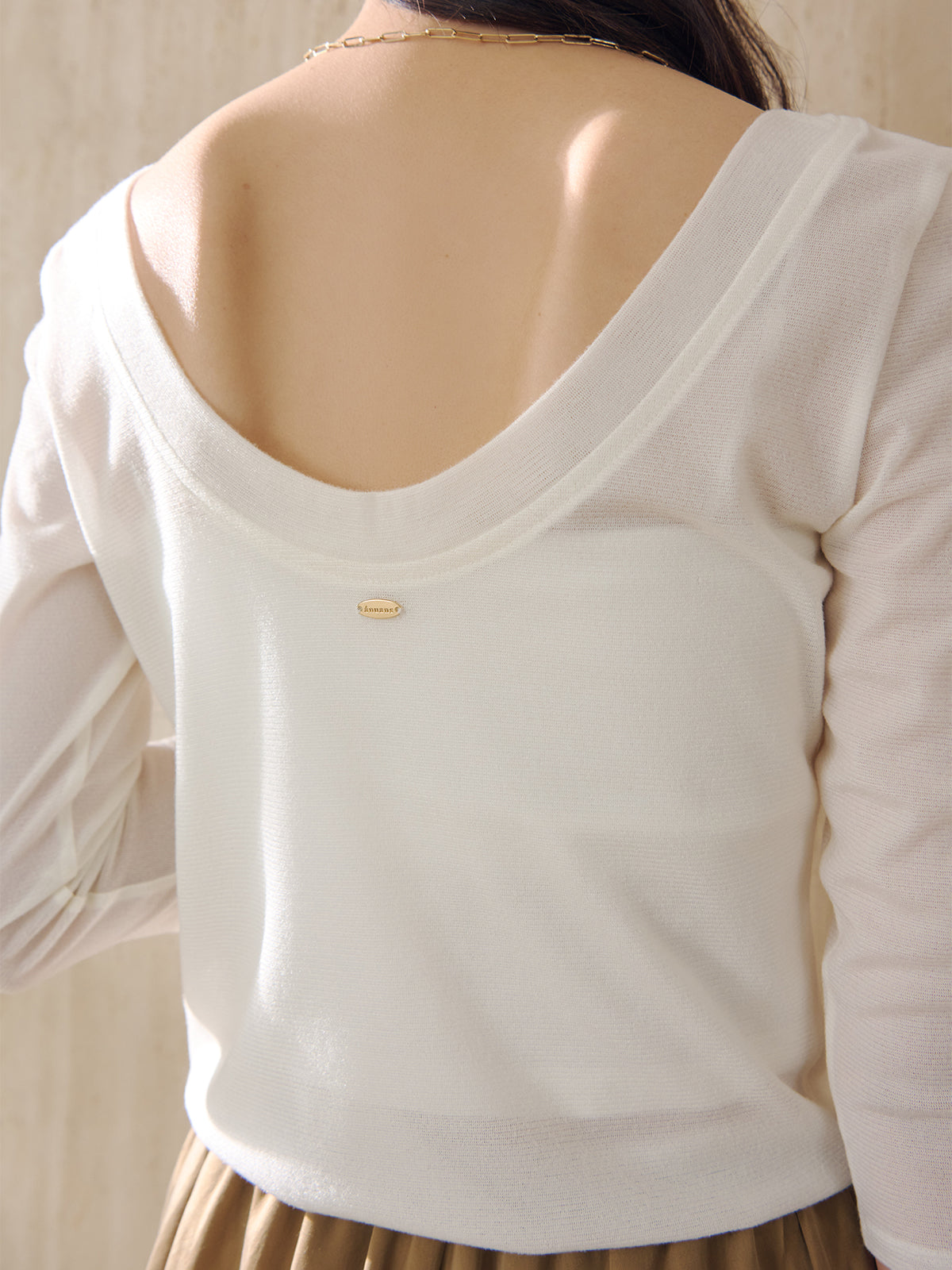 バックオープンシアーカットトップス