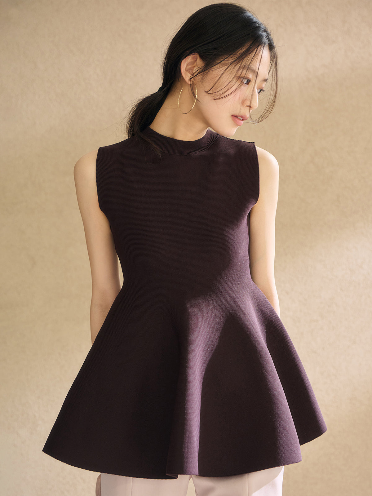 ホールガーメントペプラムニット