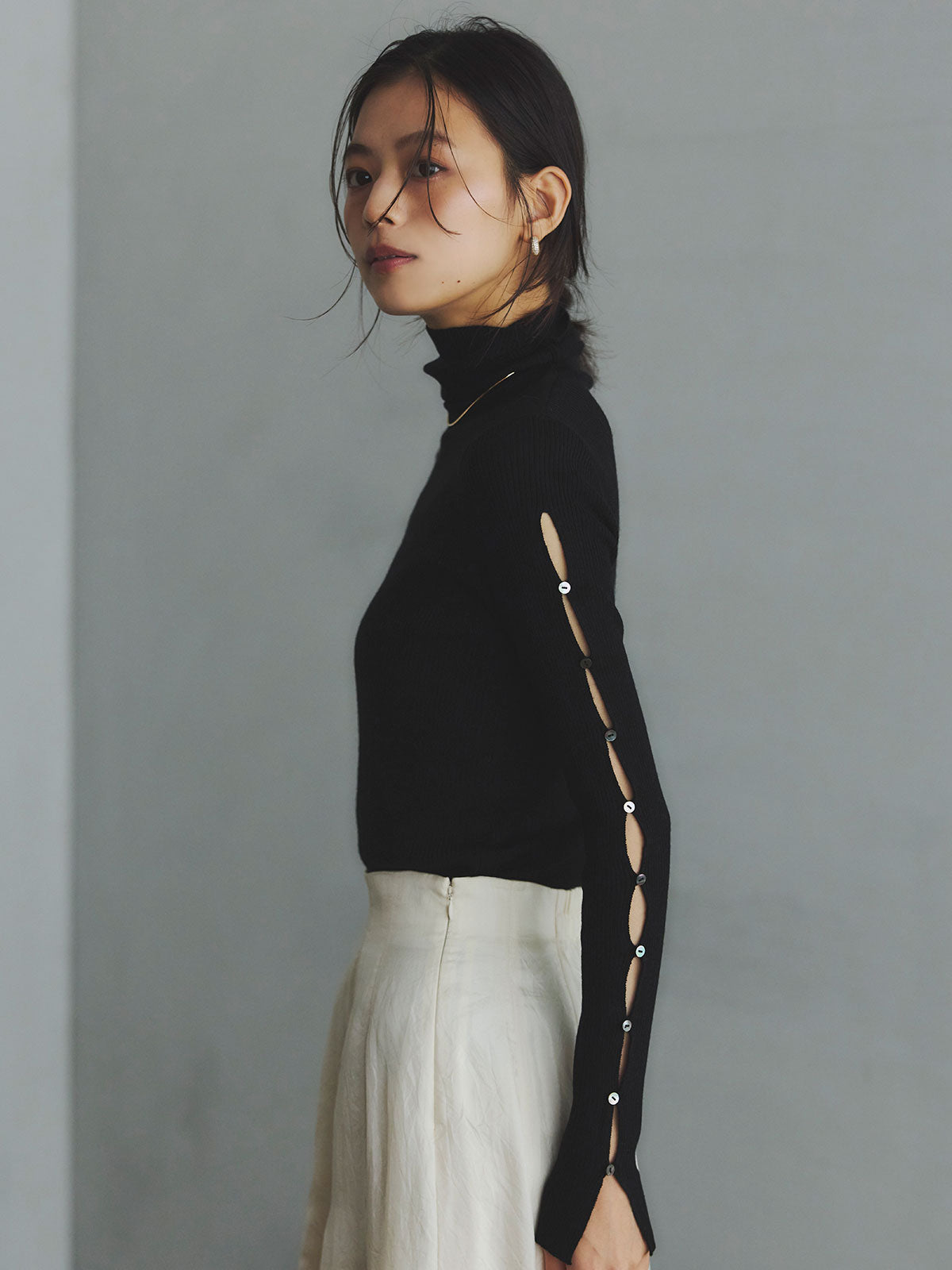 スラッシュリブニットトップス