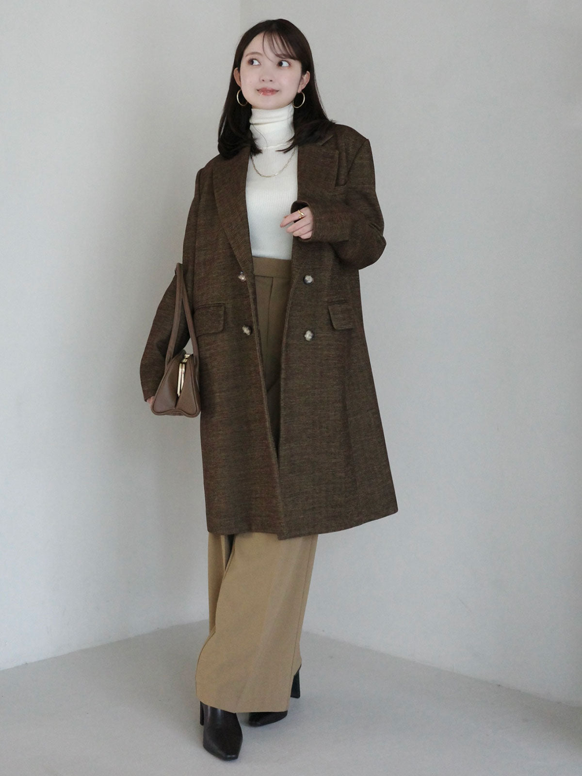 スラッシュリブニットトップス