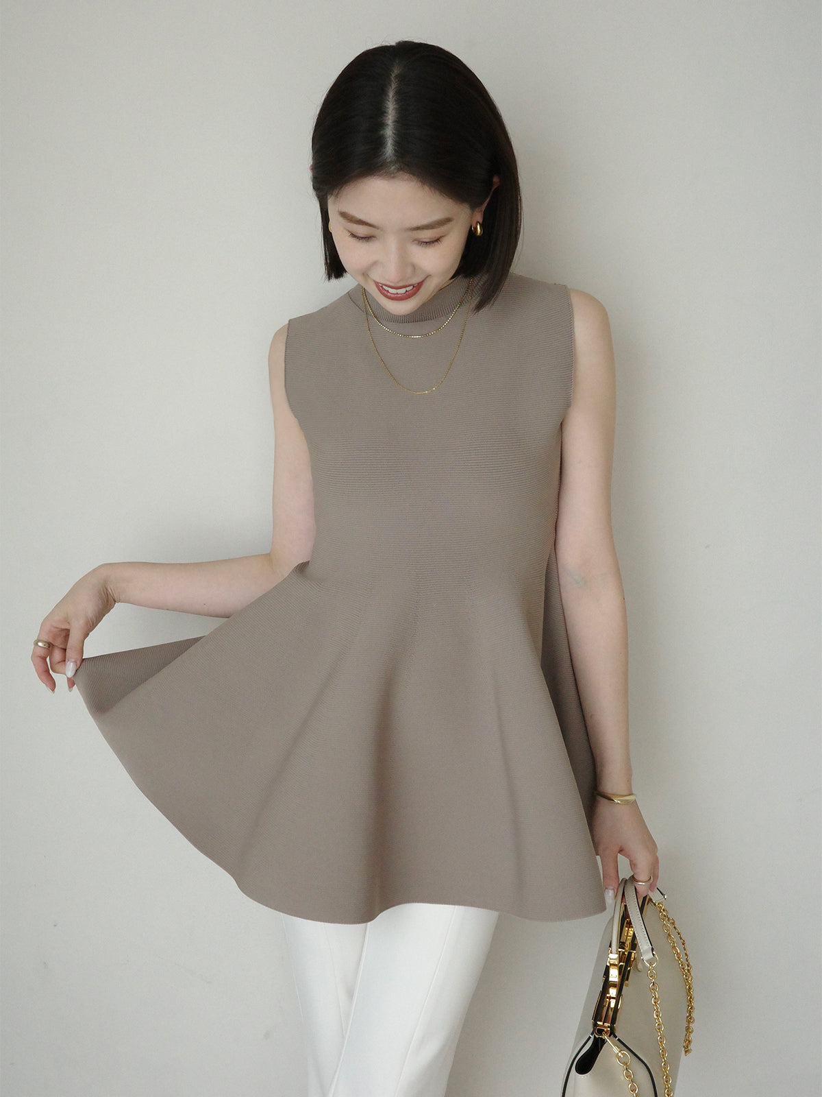 ホールガーメントペプラムニット