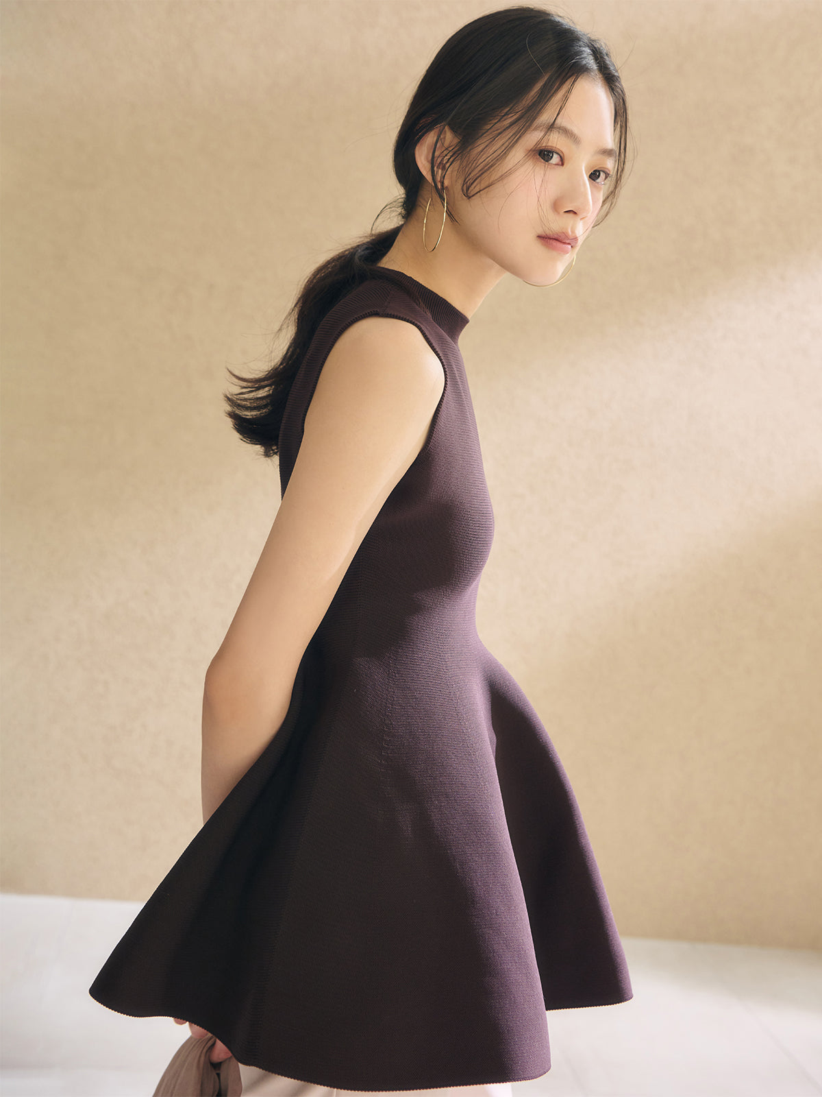 ホールガーメントペプラムニット