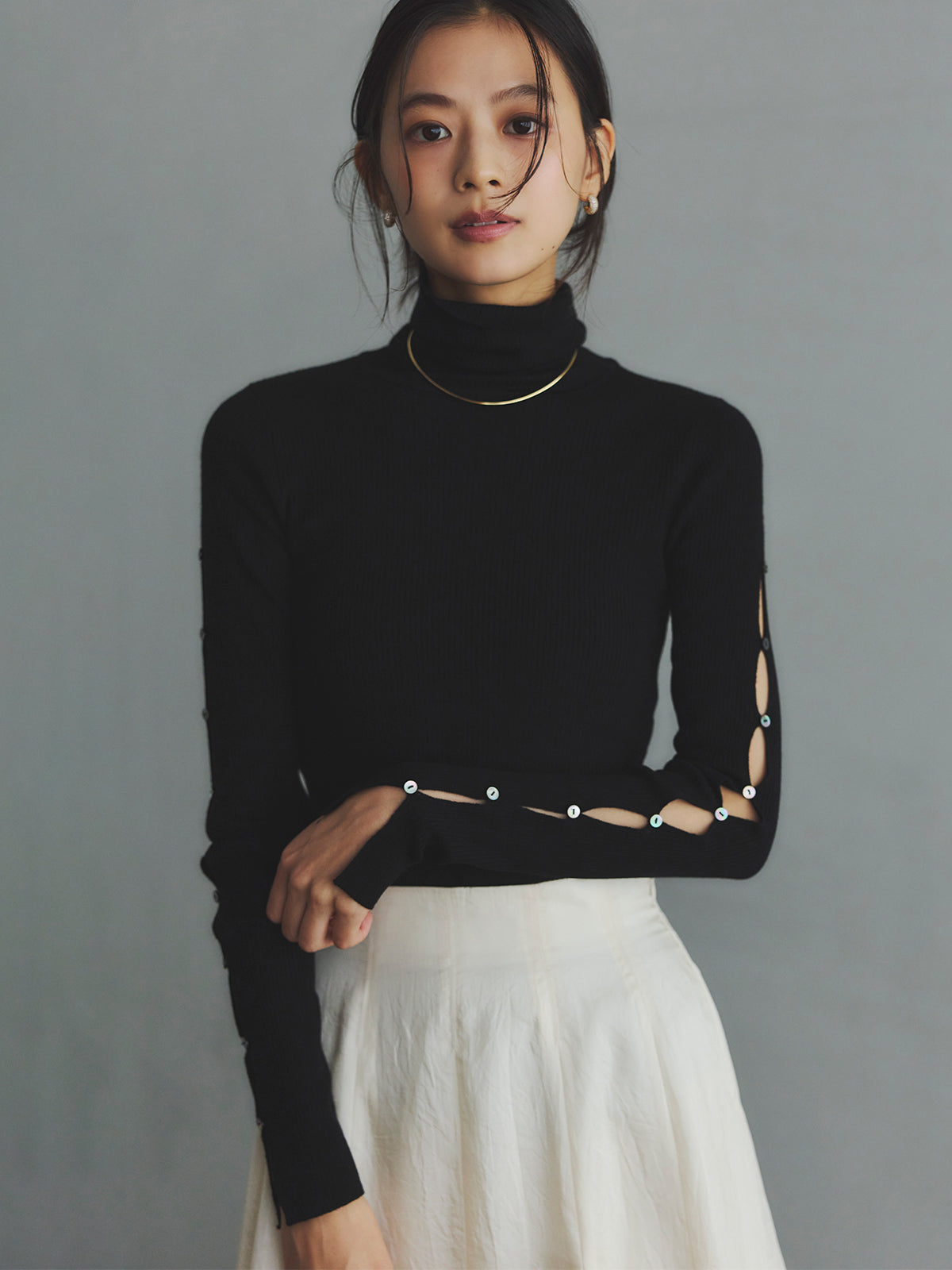 スラッシュリブニットトップス