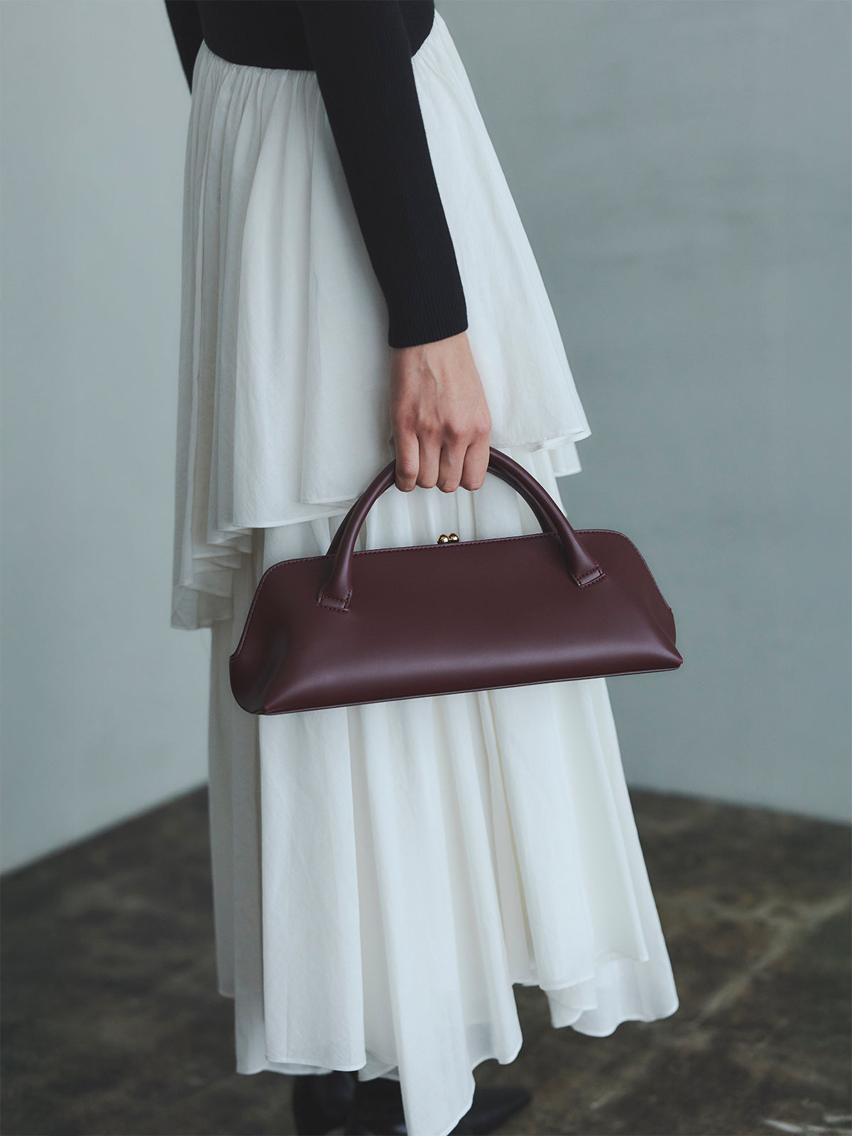 ボートネックイレギュラーヘムドッキングニットワンピース