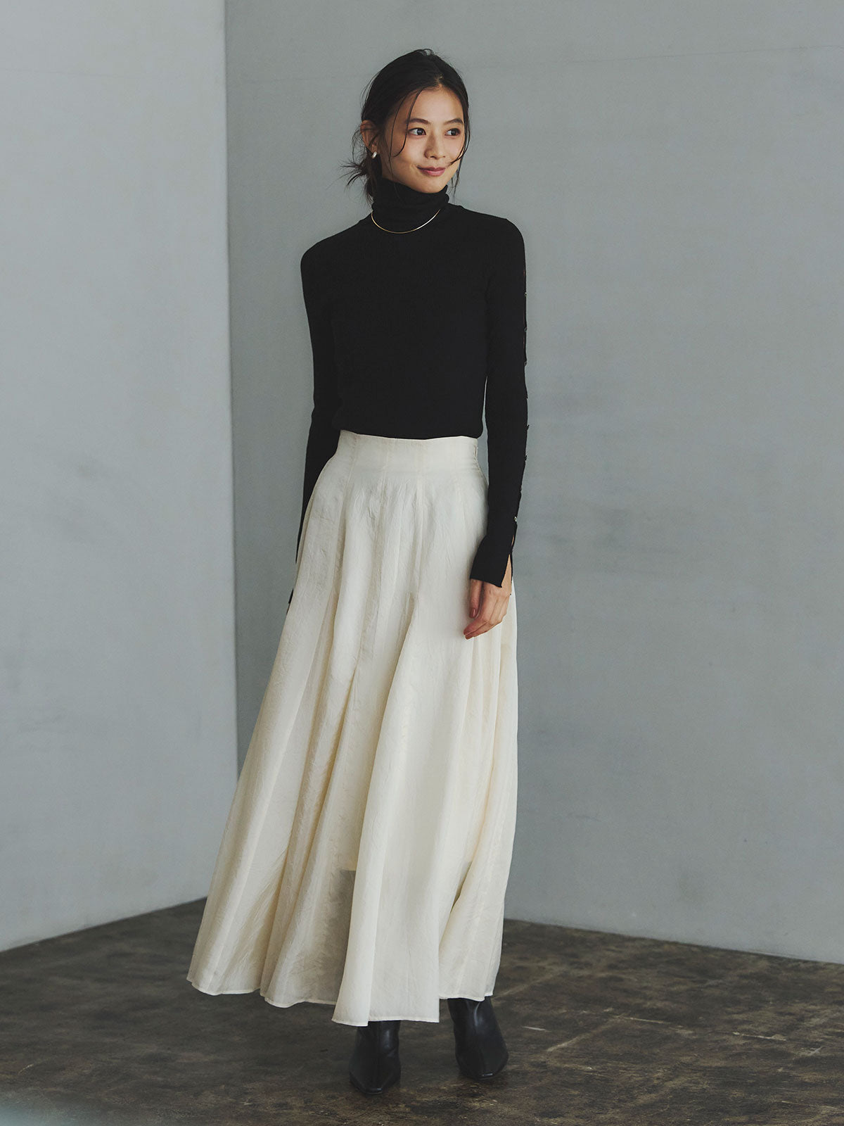 スラッシュリブニットトップス