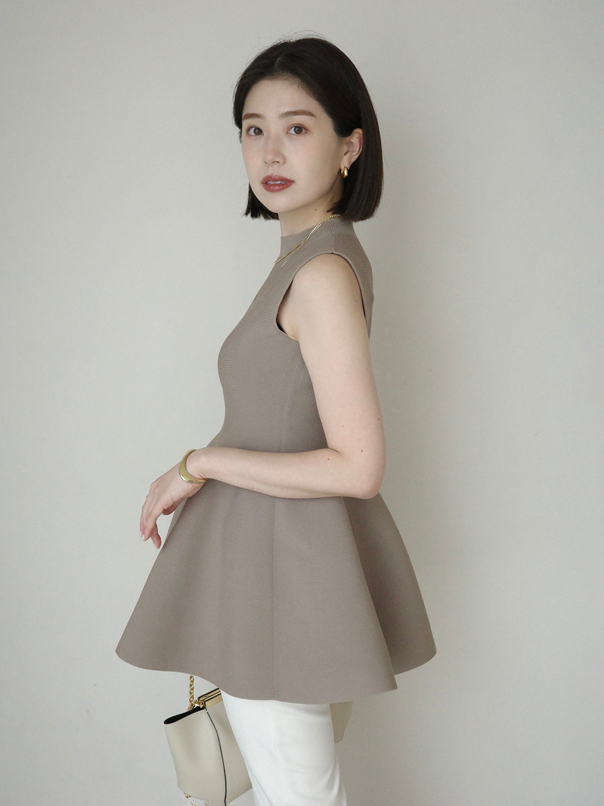 ホールガーメントペプラムニット