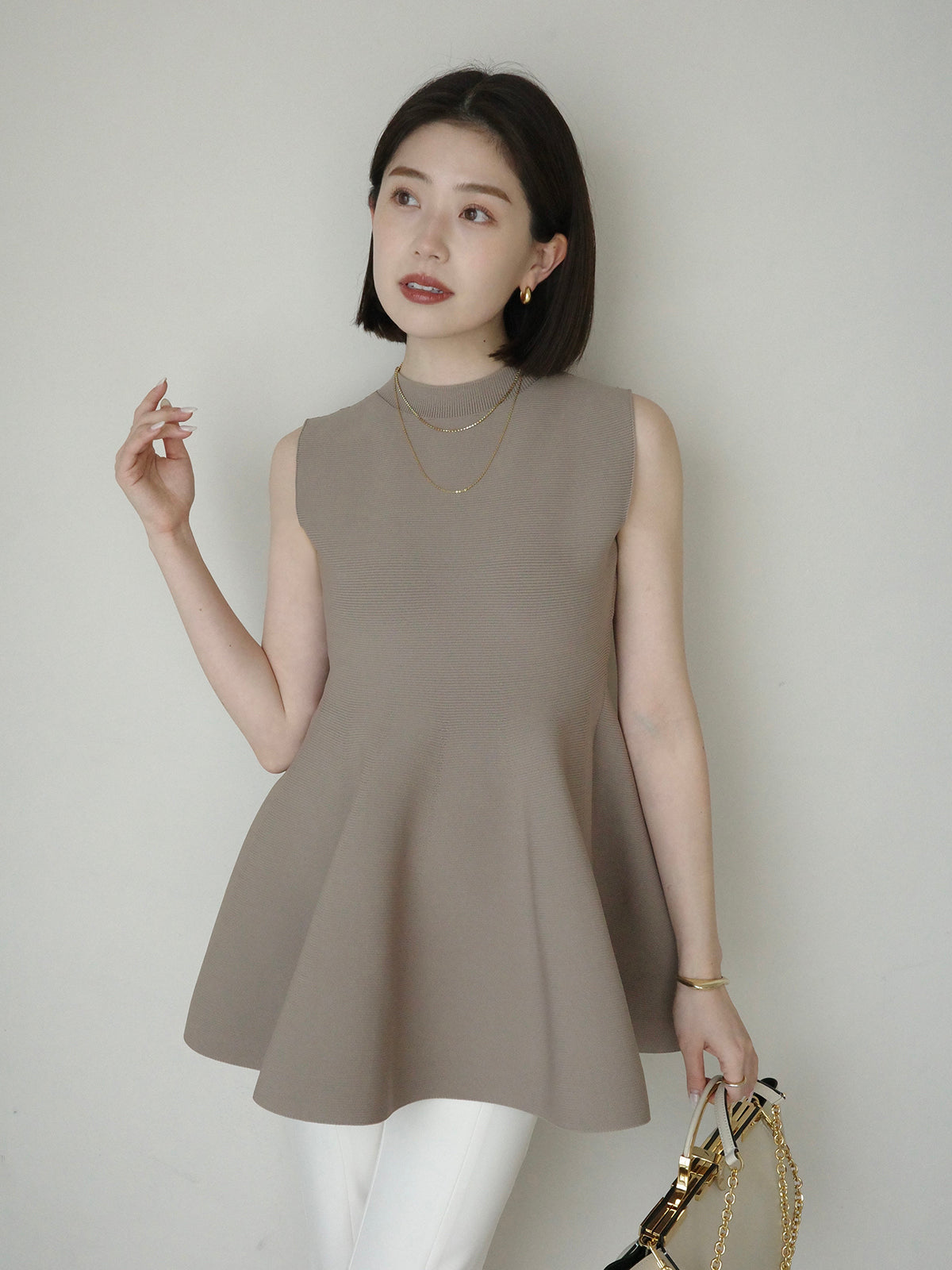 ホールガーメントペプラムニット