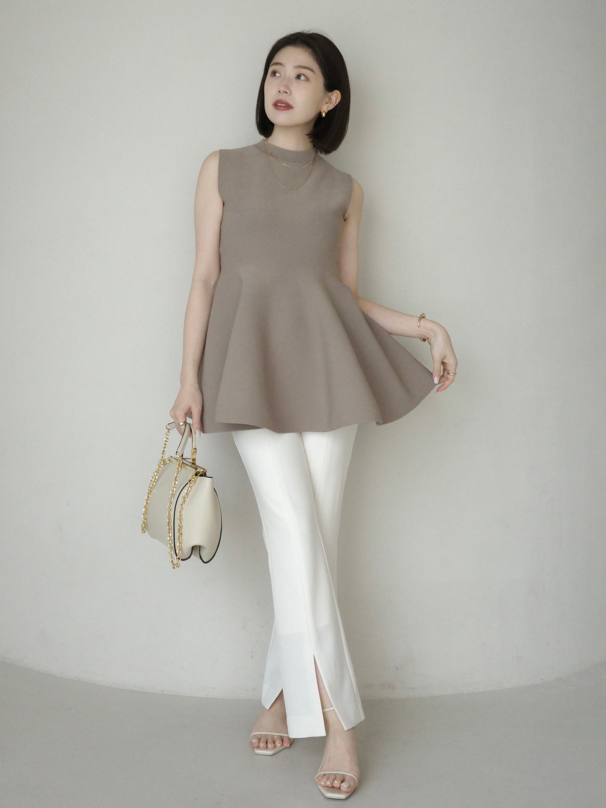 ホールガーメントペプラムニット