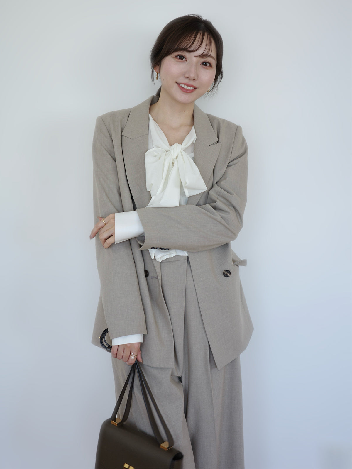 ピークドラペルダブルジャケット