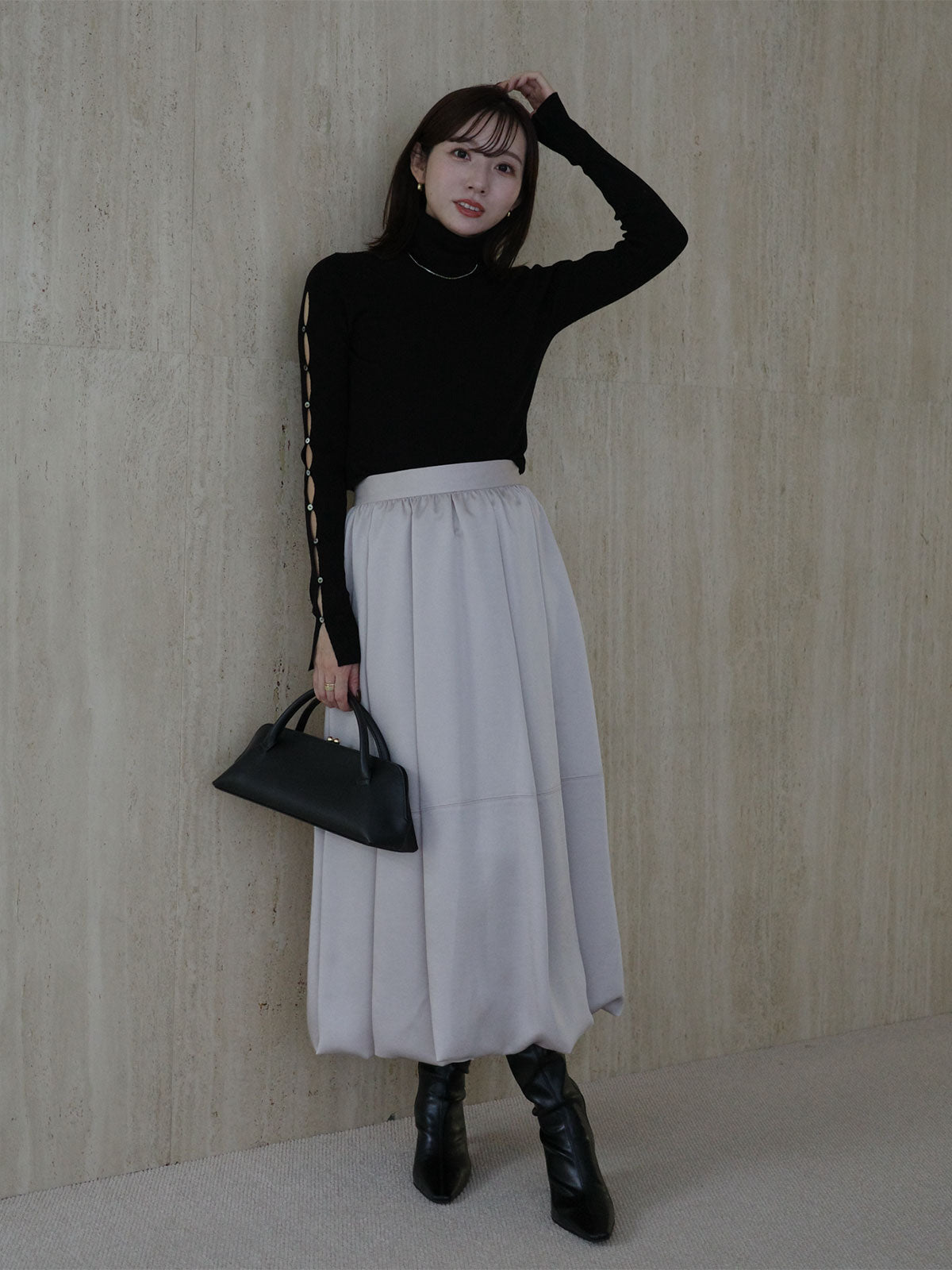 スラッシュリブニットトップス