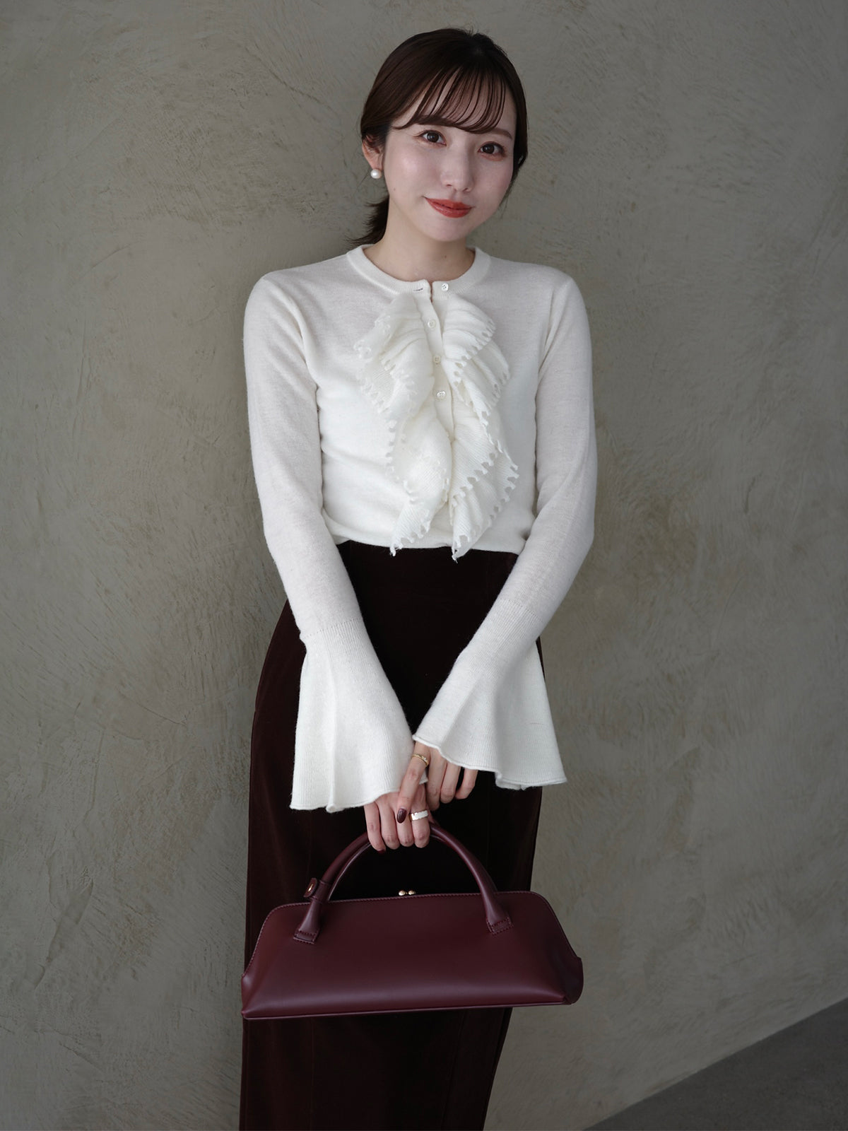 カスケードフリルニットトップス